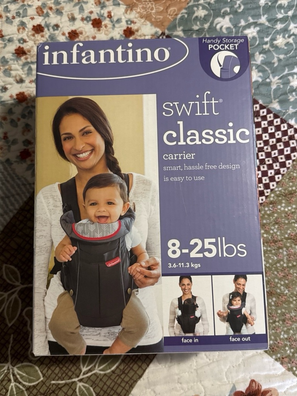Infantino baby in black with red and gray accents